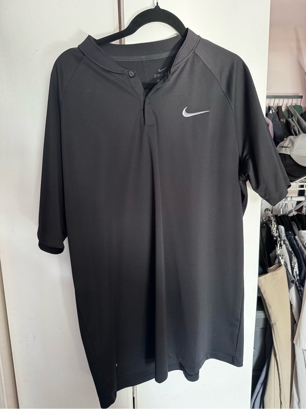 Nike Men’s Black Short Sleeve Polo with White Swoosh